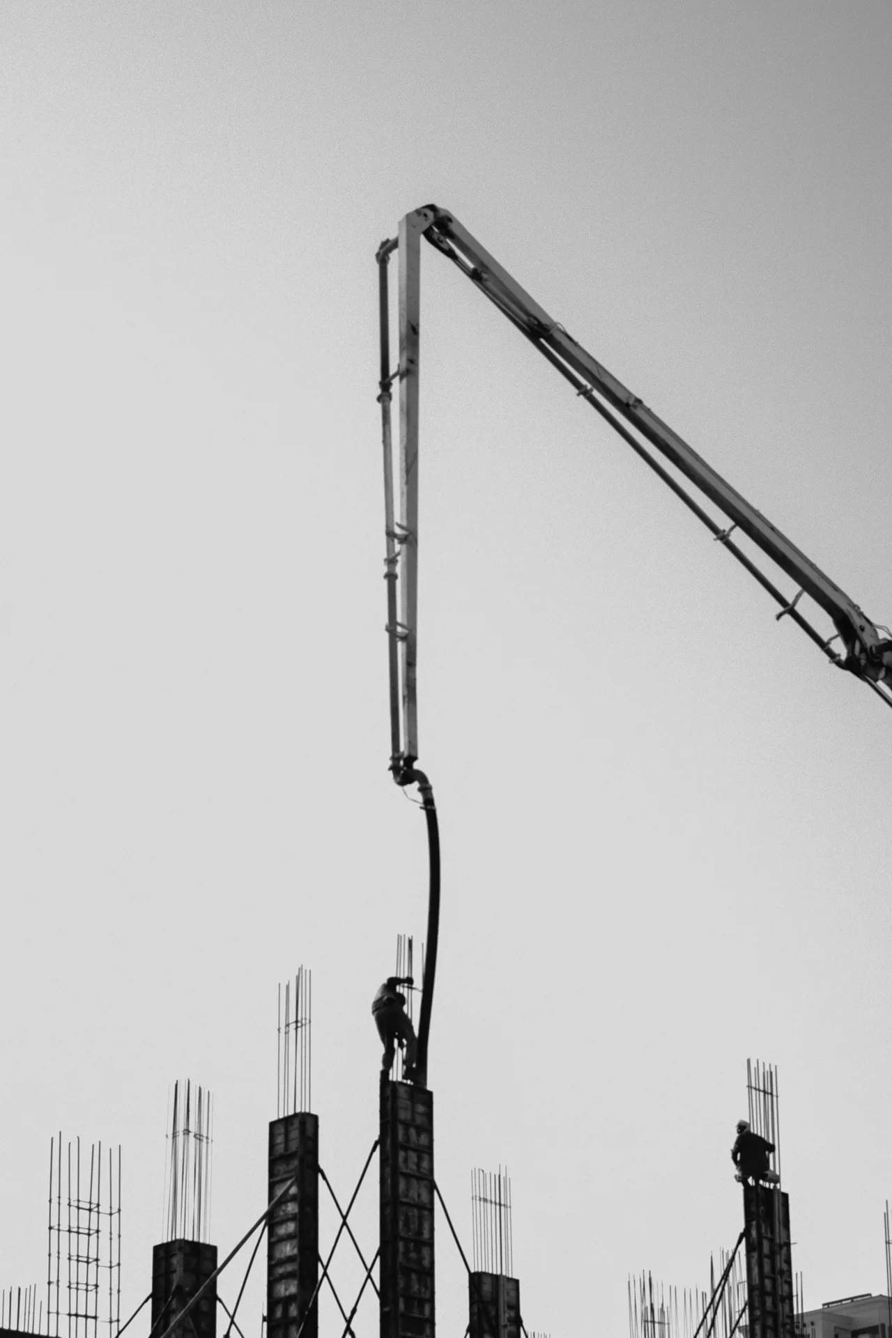 concrete pump and rebar on a tilt-up construction site in Pittsburgh