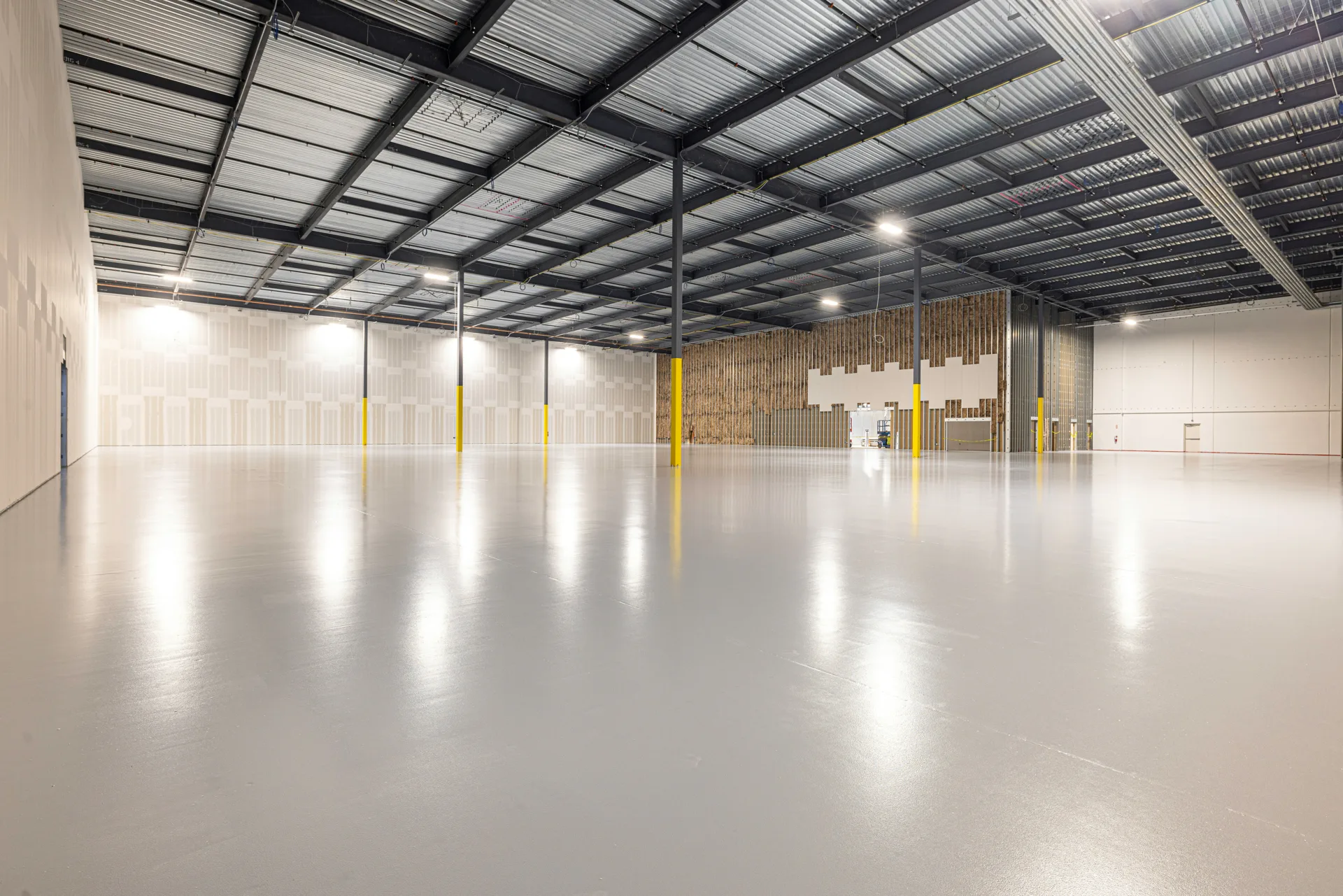 finished grey epoxy warehouse floor in a Pittsburgh distribution centre