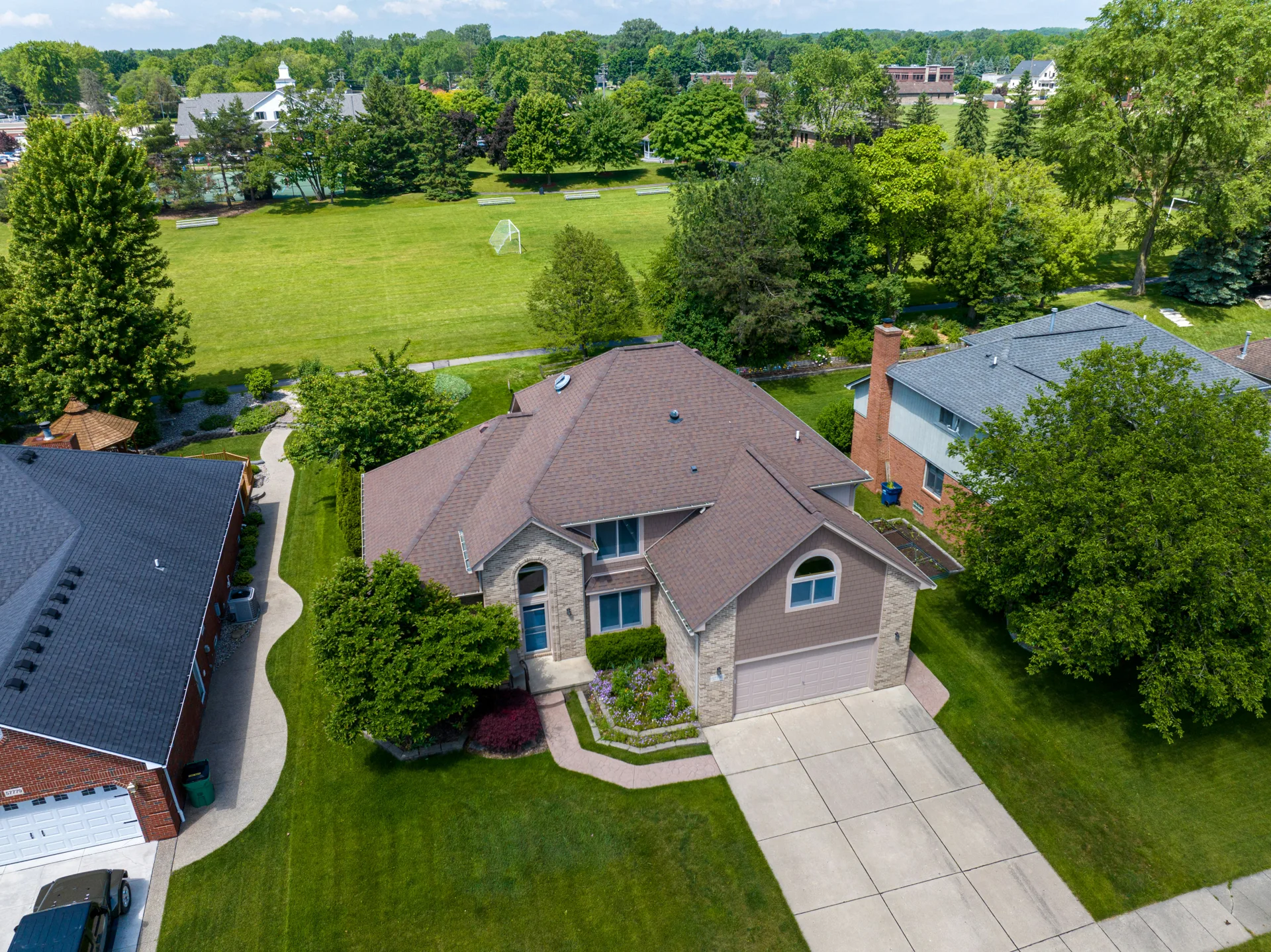 aerial view of brushed-finish concrete driveways in a Pittsburgh suburb