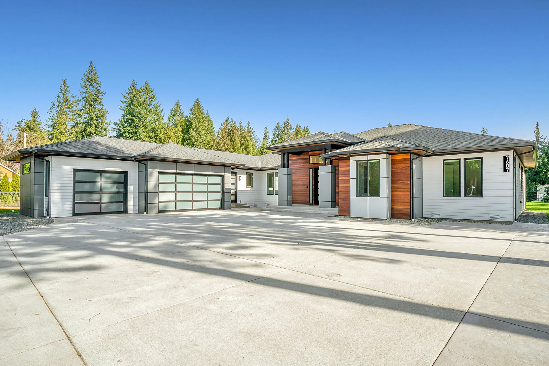 new concrete driveway at a modern three-car-garage Pittsburgh home