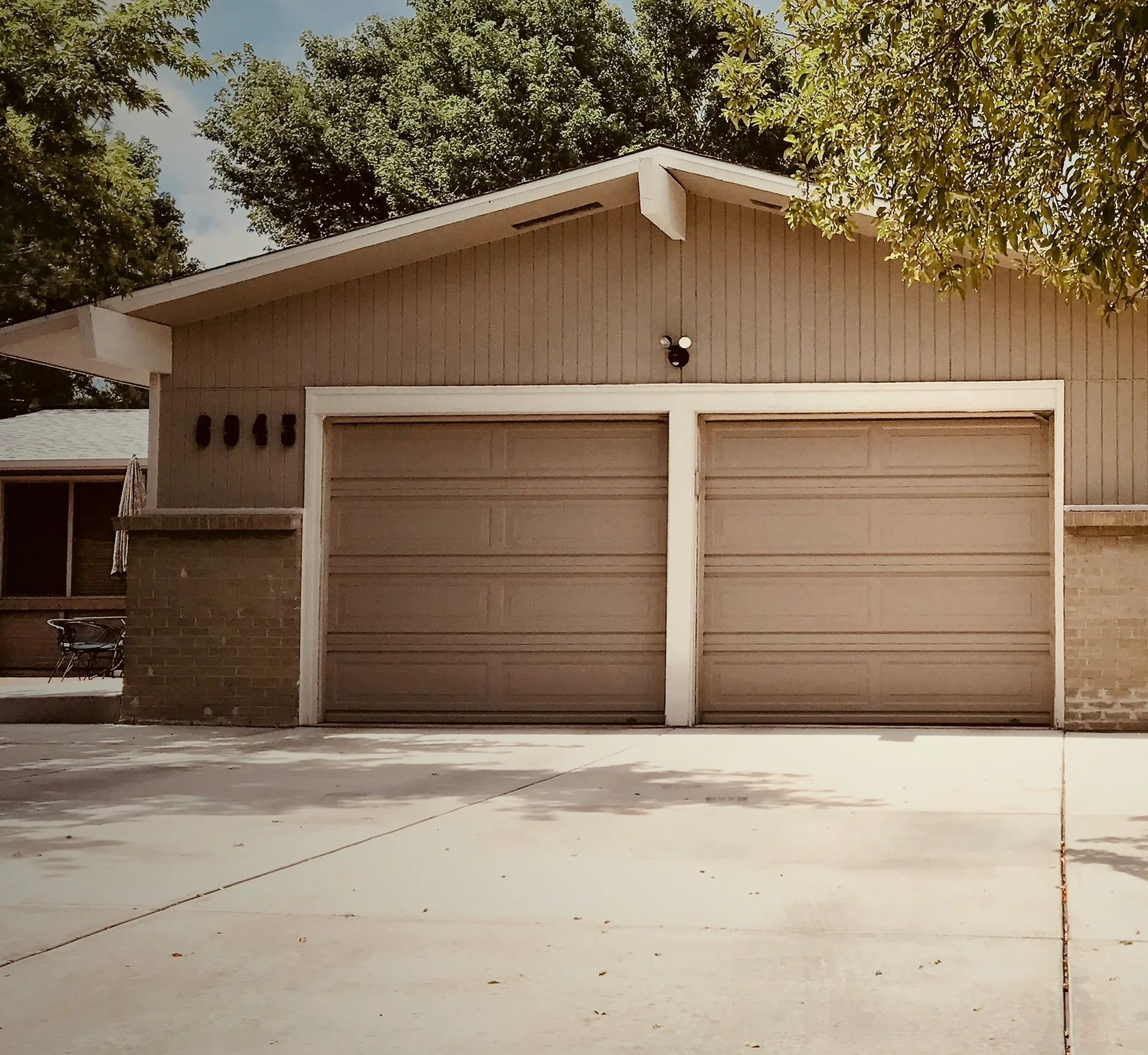 concrete driveway at a ranch home with a double garage in Pittsburgh