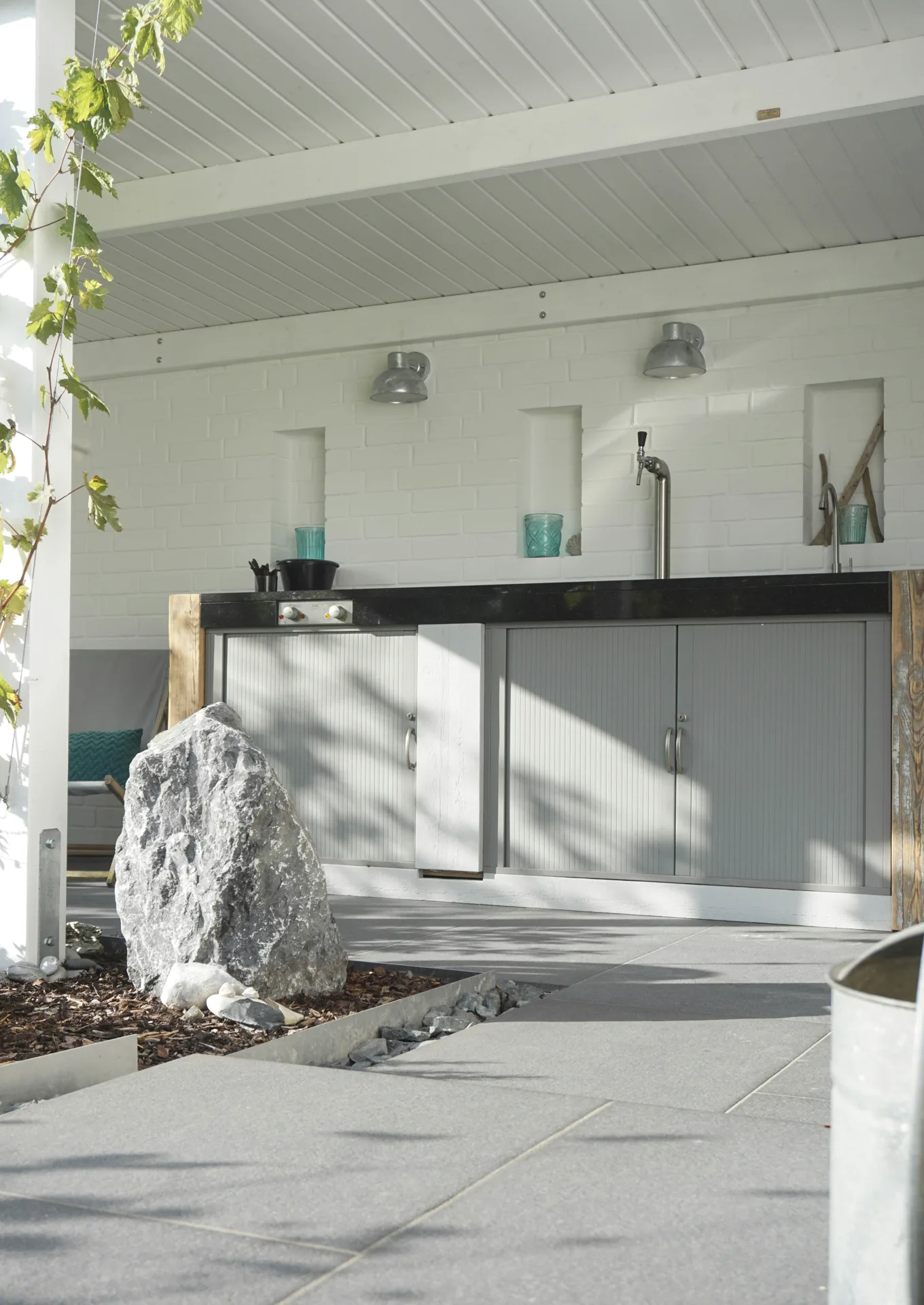 outdoor concrete countertop around a BBQ surround at a Pittsburgh home