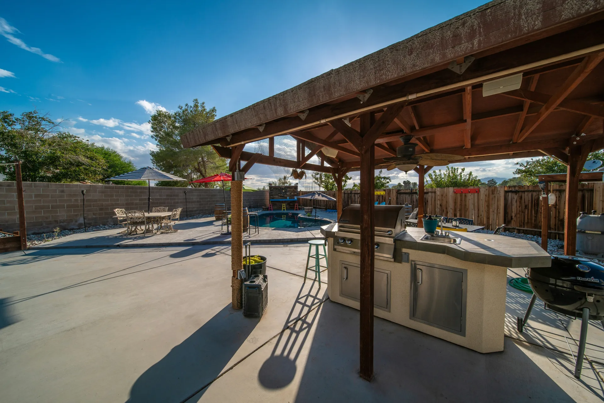 broom-finish concrete pad around a fire pit at a Pittsburgh home