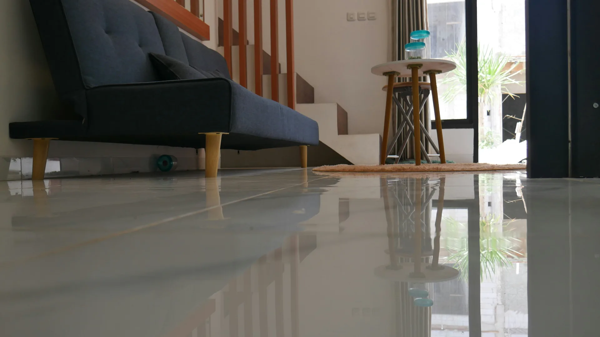 polished concrete floor reflecting light in a Pittsburgh living room
